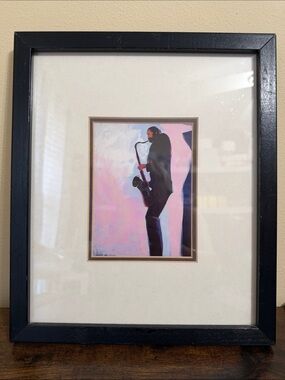 Framed Matted Sax Player 13 1/4” x 11”